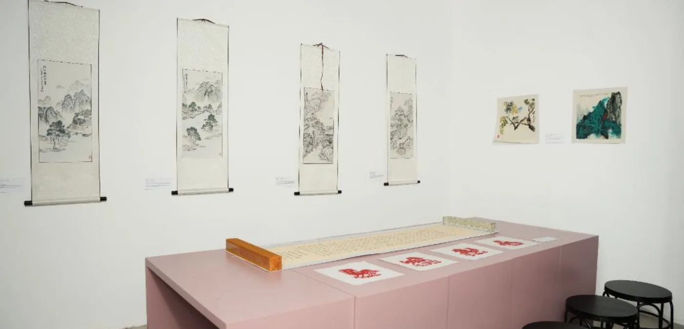 Scroll paintings and contemporary works displayed at Fluid Civilization